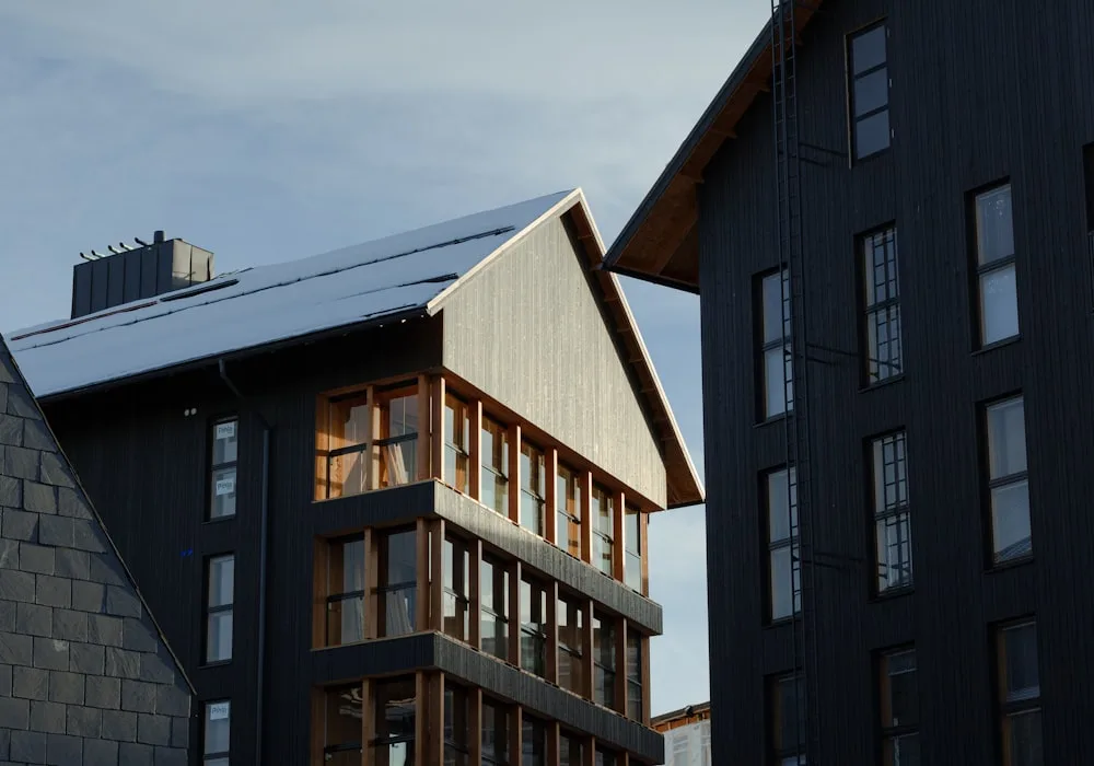 New residential roof with solar panels on a modern building
