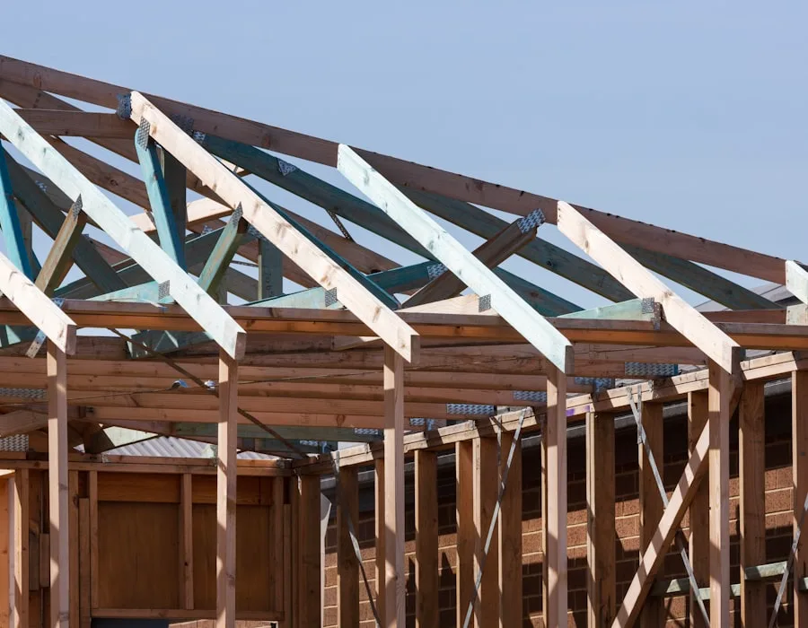 Timber roof trusses and new roof frame on a Cape Town construction site